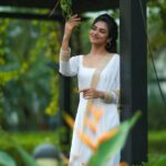 Indhuja Ravichandran Instagram - Nature First | Pose Next 💚🤍 MUAH - @thanushiya_bridal_studio Wardrobe - @faamysfashions