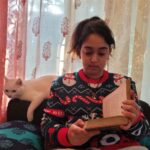 Ira Khan Instagram - I was going to put away my Christmas sweater but then today was cold! And 20° in Bombay is pretty much a snow day. So... No business like snow business! Wiza agrees. . . . #christmas #christmassweater #sweaterweather #bombay #winter #cat #cuddle #allineedismycatandmybook