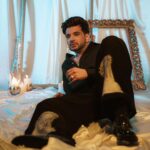 Karan Kundrra Instagram - Unrestrained. Like the God of Poseidon. Today, came out to play. Concept: @appu.rentlyblunt @tgbtroop Shot by: @that.nikhil @dotstudiosmumbai Styled by: @shreeum #StyledByTGB Style team : @anushakala Rings: @nenikaar @amamajewels Shoes: @jeetinder_sandhu Shirt: @siddhantagrawallabel (reworked) Pants: @dromodaa (reworked) Necklace: @hars_bijoux