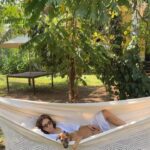 Kim Sharma Instagram - #mischka and moi swinging into another weekend ✌🏻 #puppy #thursday #reels 🐶