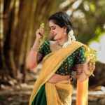 Megha Mathew Instagram - Happy Vishu 💛 📷 @v2n.photography 💄 @remyamakeupartisty 👗 @the_drape_studio #vishu #happiness #godsowncountry #stayhome #vishukani #vishuspecial #vishusadhya #traditionalwear #kerala🌴 #halfsaree