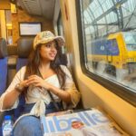 Navya Swamy Instagram - Thankful for this life through the rose tinted glass… #train #trainjourney #travel #amsterdam #netherlands #vacation #wanderlust #travelgram #blessed _#thankful #navyaswamy