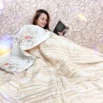Nehalaxmi Iyer Instagram - SNUGGLE Weather 🧣❄️✨☕️📔 Time to crawl under a big pretty blanket, grab a good book, watch a good Holiday movie all whilst sipping on hot Cocoa 😍🥰 This Pretty Reversible comforter giving me a warm hug in this weather is from @boutiquelivingindia . . . . . . . . . . . . . . . . . . . . . . . . . . #snuggleweather #cuddleweather #snuggles #blankets #cozyblankets #winterishere #quilt #quiltlove #reversible #cute #snuggling #hotchocolate #bookstagram #hotcocoa #wintervibes #cozyvibes #instadaily #explore #photooftheday #ishqbaaz #wintercollection #winterglow #instagood #winterquotes India