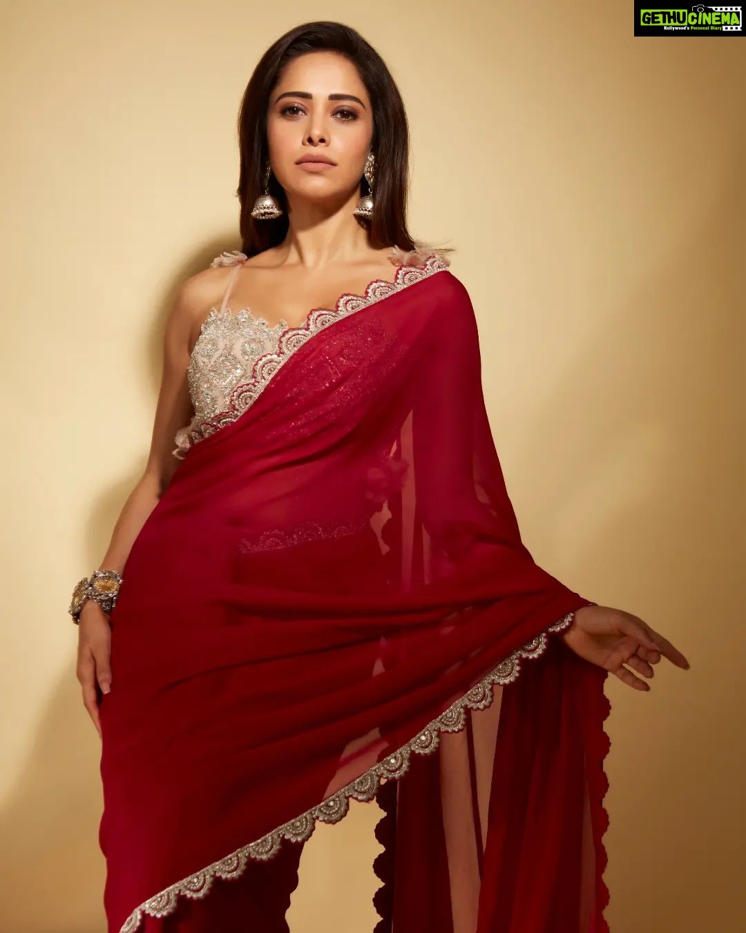 Nushrratt Bharuccha Instagram - They said I could be anything so I chose to be The Girl in A Red Saree🌹 Saree @bhumikasharmaofficial Jewelry @neetaboochrajewellery Stylist @nidhijeswani Makeup @tanvismarathe Hair @ashwini_hairstylist Photos @shivamguptaphotography