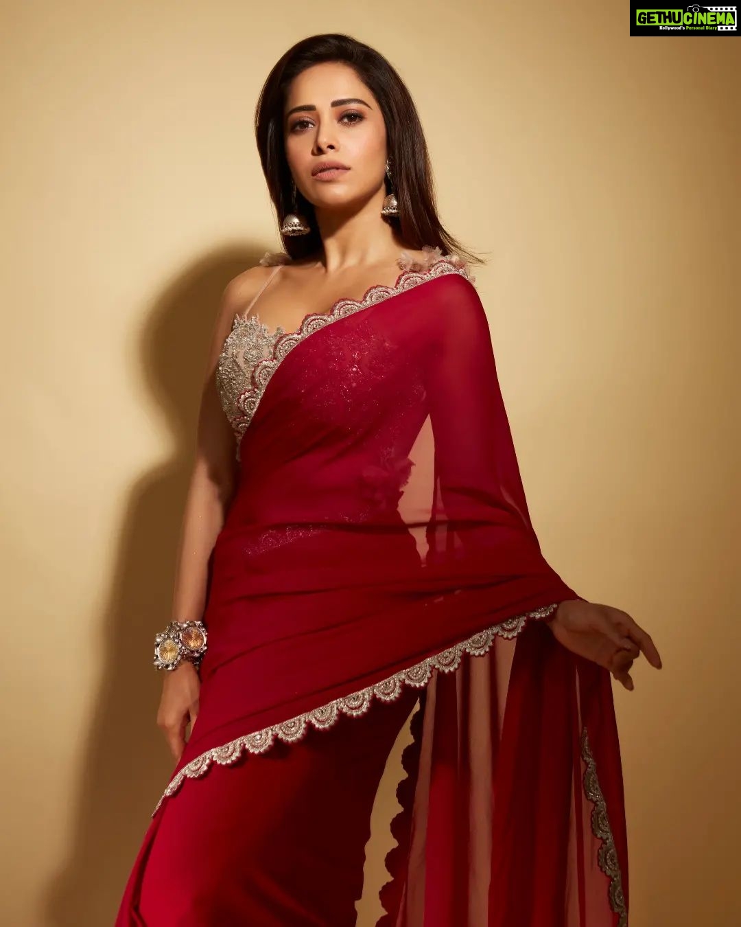 Nushrratt Bharuccha Instagram - They said I could be anything so I chose to be The Girl in A Red Saree🌹 Saree @bhumikasharmaofficial Jewelry @neetaboochrajewellery Stylist @nidhijeswani Makeup @tanvismarathe Hair @ashwini_hairstylist Photos @shivamguptaphotography