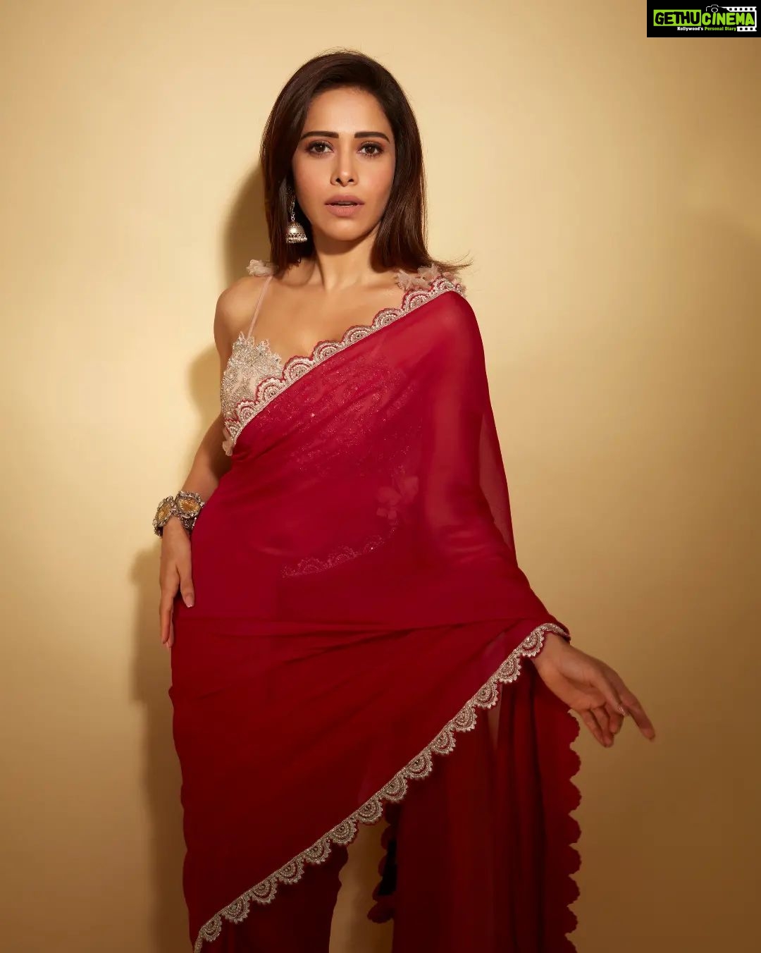 Nushrratt Bharuccha Instagram - They said I could be anything so I chose to be The Girl in A Red Saree🌹 Saree @bhumikasharmaofficial Jewelry @neetaboochrajewellery Stylist @nidhijeswani Makeup @tanvismarathe Hair @ashwini_hairstylist Photos @shivamguptaphotography