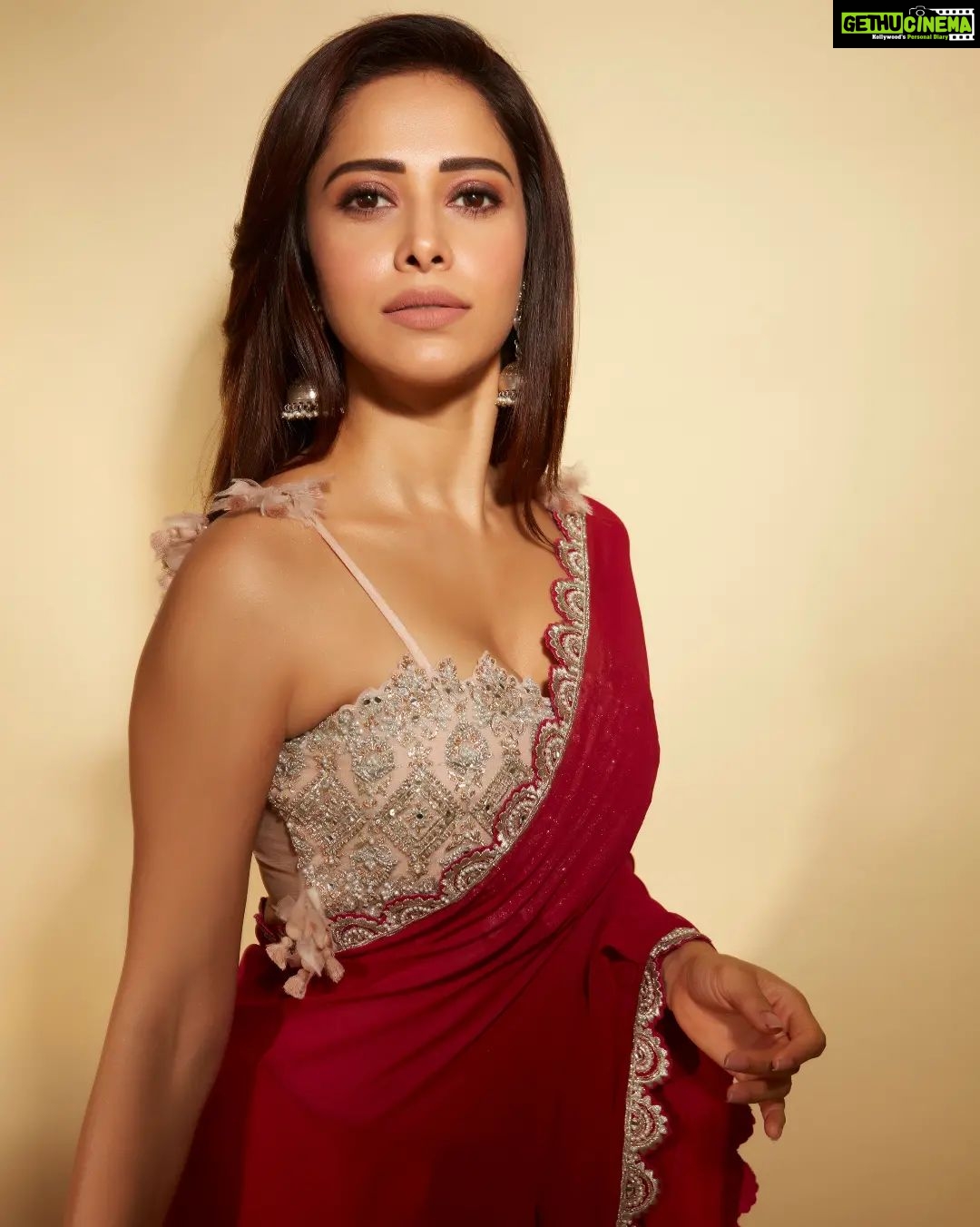 Nushrratt Bharuccha Instagram - They said I could be anything so I chose to be The Girl in A Red Saree🌹 Saree @bhumikasharmaofficial Jewelry @neetaboochrajewellery Stylist @nidhijeswani Makeup @tanvismarathe Hair @ashwini_hairstylist Photos @shivamguptaphotography