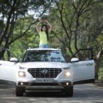 Pallavi Gowda Instagram - People get an adrenaline rush when they do something exciting. It varies from person to person. I had it today when I drove the Venue iMT. It has sporty exterior looks, stylish interiors, loads of space, and more importantly, it is a connected car. While I was driving this car I was #Leftfree. This festive season rush to your nearest Hyundai dealer and join the #Leftfree revolution. #HyundaiIndia, #HyundaiVenue. @HyundaiIndia @BlueHyundai.