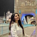 Pooja Sawant Instagram - She's headin' for somethin' that she won't forget Havin' no regrets is all that she really wants Tower Bridge, London-Uk