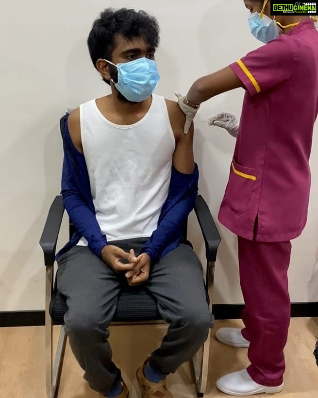 Pradeep Ranganathan Instagram - After you vaccinate , the chance of you dying because of covid is reduced to .000197 % Got vaccinated along with @ashwath_marimuthu (Director of Oh my kadavuley ) . #CoronaVaccine #CovidVaccine To get a clarity on the myths of vaccine , I just did a simple math . World wide cases 16.6 Cr, Deaths - 34.5L Death rate - 2.07 % Vaccinated People 11.3 cr , Deaths because of covid even after vaccation - 223 Death rate - 0.000197 The chance of you dying because of covid is 10152 times more than you dying after getting vaccinated because of covid . Kauvery Hospital Chennai