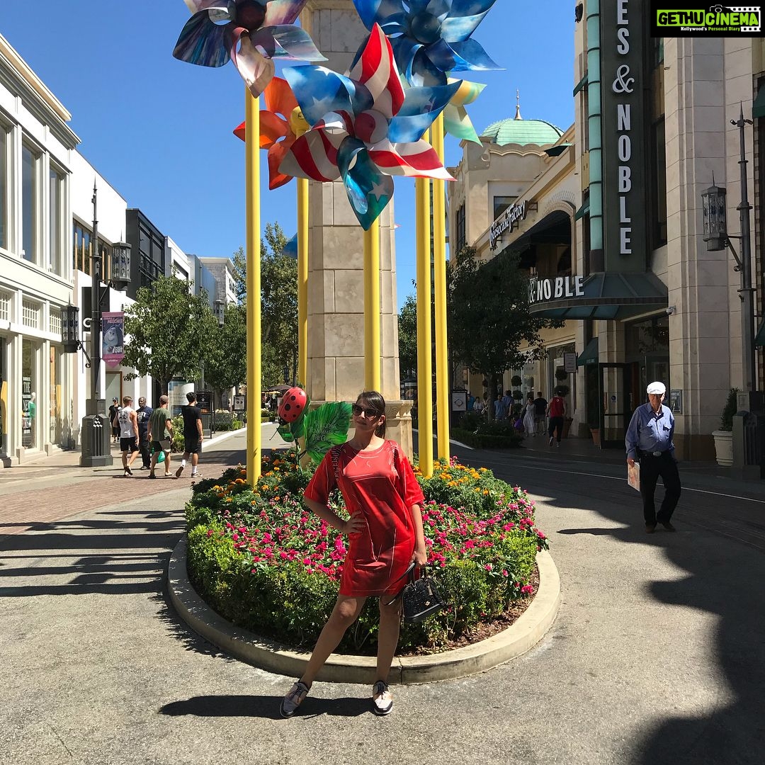 Preeti Jhangiani Instagram - When you’re in the mood for some frenzied shopping .. wear red! #moschino #losangeles #thegrove #shoptillyoudrop The Grove