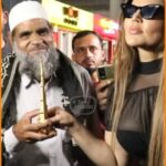 Rakhi Sawant Instagram - So Sweet ! Drama Queen Rakhi Sawant Gifts Burj Khalifa To An Old Man At The Airport