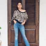 Rhea Chakraborty Instagram – 🦋Jalebi vibes in this top by @madison_onpeddar , styled by @sanamratansi @style.cell ( assisted by @nikhitaniranjan )  photography by @shaikhhamza_photography 🦋