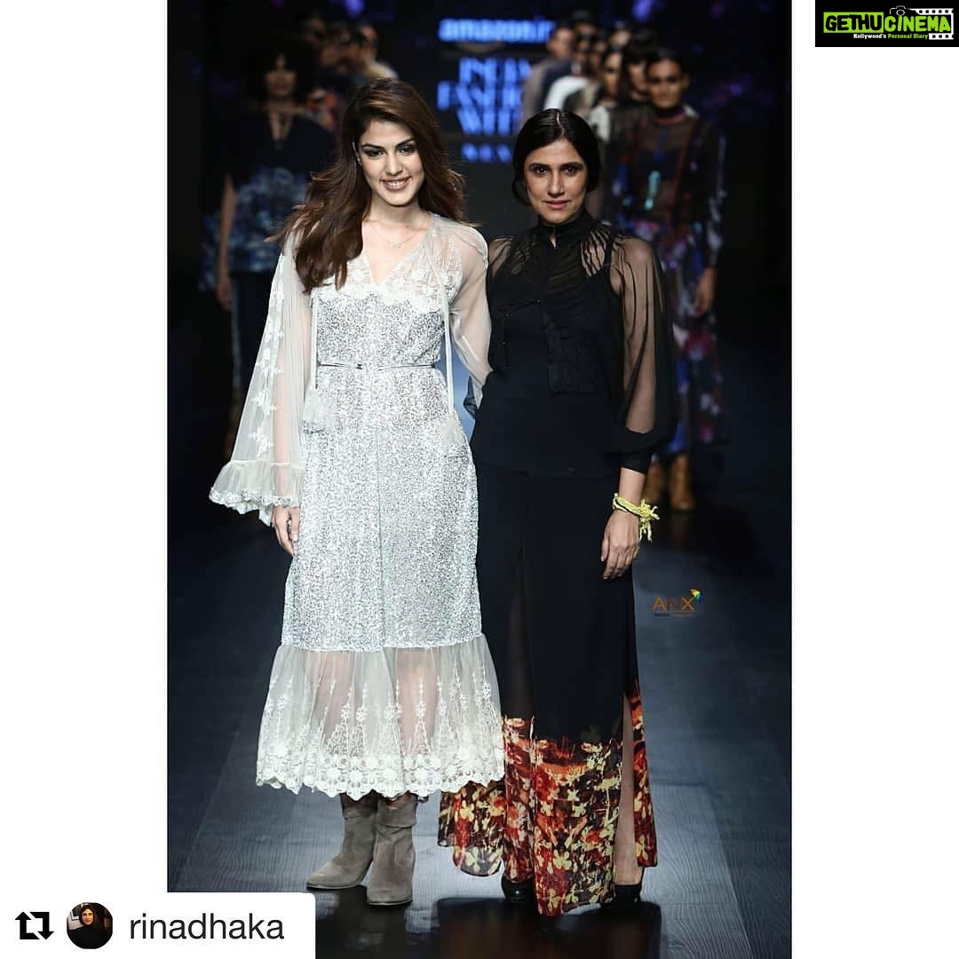 Rhea Chakraborty Instagram - The show did go on , and how ! #amazonindiafashionweek #Repost @rinadhaka with @get_repost ・・・ Silver dusty sparkle dress with big sheer lace sleeves worn by rhea nd i wear blk trousers with printed hem of flame of flowers ; with the fun nd pretty Rhea .