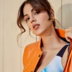 Rhea Chakraborty Instagram – Orange is the new 🖤!

#rhenew 

Styling : @theanisha 
Bodysuit and Bomber : @cilvrstudio 
Boots : @vanillamoonshoes 
Jewellery : @radhikaagrawalstudio 
Makeup : @makeupbyrishabk 
Hair : @richie_muah 
📸: @kaasastudio