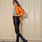 Rhea Chakraborty Instagram – Orange is the new 🖤!

#rhenew 

Styling : @theanisha 
Bodysuit and Bomber : @cilvrstudio 
Boots : @vanillamoonshoes 
Jewellery : @radhikaagrawalstudio 
Makeup : @makeupbyrishabk 
Hair : @richie_muah 
📸: @kaasastudio