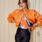 Rhea Chakraborty Instagram – Orange is the new 🖤!

#rhenew 

Styling : @theanisha 
Bodysuit and Bomber : @cilvrstudio 
Boots : @vanillamoonshoes 
Jewellery : @radhikaagrawalstudio 
Makeup : @makeupbyrishabk 
Hair : @richie_muah 
📸: @kaasastudio