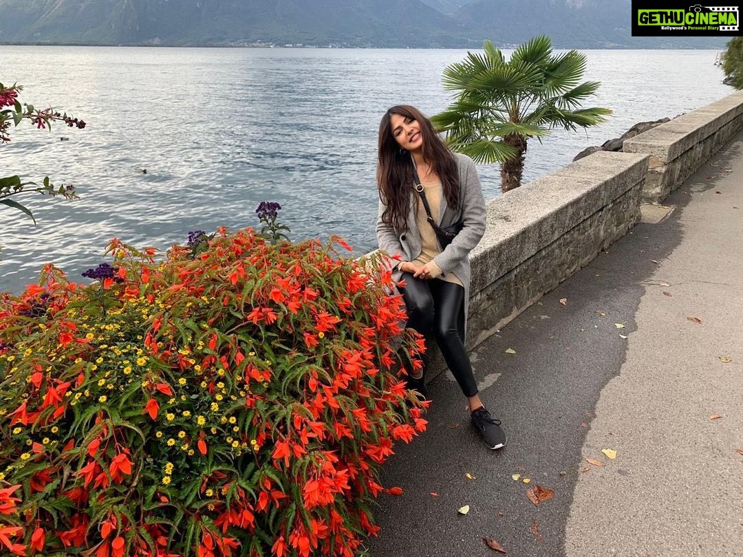 Rhea Chakraborty Instagram - My earnest opinion It's the bubbles of opinions that reside in the tiny molecules of air , building tiny homes all around us. The tiniest of these homes Is the one we call self opinion .. It's a small little shack full of red roses , often abandoned , seldom vanity fed, and always the primary . The second I feel someone's pupils expanding to address enough light , so as to look into my tiny self opinion shack .. And I quickly shun the light away. Why should I let a stranger come over just like that.. Humbled by my own protests , my ears suddenly get blocked ... As though I've been on a flight all night long! A beautiful house right around the corner , on lane oxygen .. Just above my self opinion home .. Is home to what I very fondly call “perception of perceptions” .. It's my favourite house in this colony.. Because it looks very different everyday .. Although it remains the same eventually ., that's what perception does I guess .. Home to so many different kinds of opinions..the air colony is densely populated, with tenants and owners constantly fighting for occupations .. But the central government here is managing the front with true earnesty!! It's strange how a lot of us live in our respective colonies .. Aware of the air colony .. Simply ignoring and avoiding it.. In my earnest opinion .. We need to have an opinion about all other opinions .. Because , this is our only way of feeling that we are after all the home -of - opinions - or as science fondly calls us the homosapians..;) 🌹 #rheality #imapoetandnowyouknowit