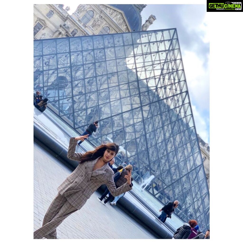 Rhea Chakraborty Instagram - #Louvre 💜 Life came around a full circle , once again . The widowed nuts fell off the branches , It looked like the tree of life was shedding tears .. Each nut falling on people's heads They had gathered to watch this mighty tree break down and cry. She wouldn't stop shedding these drops of nuts , they wouldn't stop gathering by A chill ran down her bark all into her roots , And the Earth shook and people let loose She burst out laughing , dancing , singing a song The tree of life had shed her thorns She was now ready to bear more fruit than ever ; What use would they be ? - all these little people were now scared of her , forever So she uprooted herself , and walked off There she goes , hopping away into infinity She had finally found peace ,love and divinity ! #rheality #imapoetandnowyouknowit