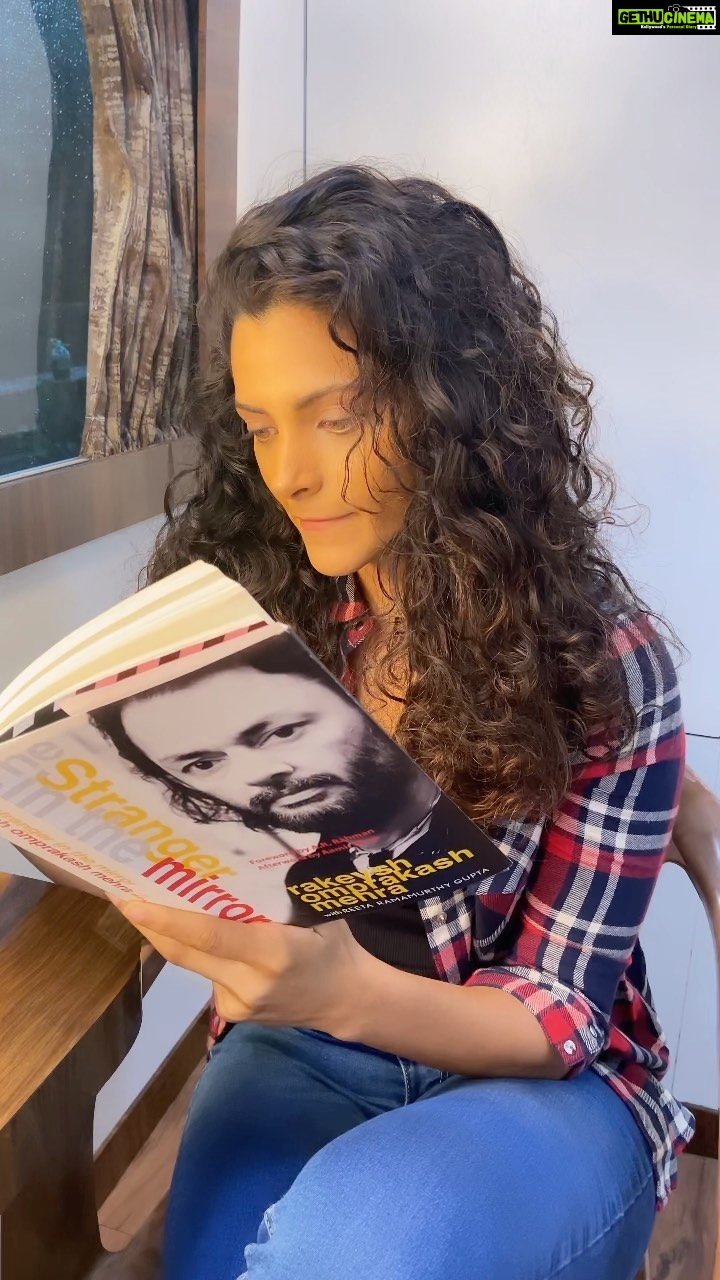 Saiyami Kher Instagram - The perfect company for a rainy day is hot chocolate and warm conversations. And when there is a lot of waiting around during shoot and no people to talk to, there are books! So, I finally started with up my favourite, @rakeyshommehra ‘s book - The Stranger In The Mirror. With @officialreetagupta Rang De Basanti was a cult film for my generation. So, the thought of debuting in a film that Rakeysh Sir was going to direct was nothing short of a dream. Through the two years of making Mirziya, I know I developed a lifelong bond with Sir. He's as good as my family. Even today, five years after my debut, if I want film-related advice or I want home-cooked food or need swimming lessons he remains my go-to person. During the shoot, without even realising what he was doing, Sir would keep showering me with pearls of wisdom. He'd make a casual remark about something, and I'd keep thinking about it even days after had said it. He once told me how the film industry is a very lonely place. And that one must know that the people who praise you to the skies are also the same ones whowill also dump you to the ground. So don’t take any of this too seriously. He'd keep telling me to follow my heart. He'd say that if I stayed true to my craft and kept focusing on getting better, success or failures would become inconsequential. There are many such stories. And I can keep writing about them. I know that Rakeysh Sir made me a stronger and better person. Can’t wait to turn these pages and relive why this man is so special.