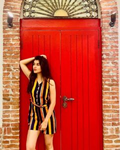 Sanjana Sarathy Instagram - Always had a thing for vibrant doors 😍
.
. 📸 : @vatsavage :) 
.
@lp_2096 @vishnupriya_ravi : this outfit 🥺 thank youuuuu! 
.
.
 #ferrari #ferrariworld #best #vacay #vacaymode #holiday #chilling #vibes ♾