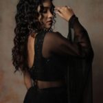 Sanjana Tiwari Instagram - Last one from the series 🖤 . . . Shot by - @sat_narain @the.portrait.culture Outfit - @navyah_thedesignstudio @sivagamisubbian_label Mua - @roopa_ravi_mua Hair - @makeup_with_maks #varisu #varisuaudiolaunch