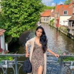 Sarah Jane Dias Instagram - day trip to Bruges! . what do you get when you mix the magic of transportation with the wonders of technology? you get @leshuttle @eurotunnel ! the reason why i was able to make it to Bruges and back on the same day!! . now, what to do when one is in Bruges? eat first OBVIOUSLY. get some mussels and local asparagus (check if they're in season). and you must get some chocolate. I like mine dark, the darker, the better. and how can you not eat a Belgian waffle in Belgium?! there's of course lots to see too and i recommended ambling along as you digest your strawberry and cream waffle and discovering it all for yourself... with preferably no fixed agenda... . happy travels my loves! . #traveldiaries #travelgram #travel #girlsgottatravel #bruges🇧🇪 #bruges #visitbruges #visitbelgium #belgium #instareels #travelreel #travelreels #instatravel . p.s i know the song choice has nothing to do with the video but i just love @ayanakamura_officiel 's music Bruges, Belgium