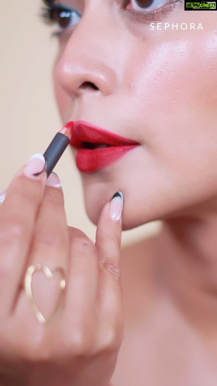 Sayani Gupta Instagram - #ad The best eyeliner hack and my statement red lip! Here’s a closer look at how I create my signature. It’s bold, colorful, fun and perfect for any special occasion. Here’s everything I used ✨Bobbi Brown skin long-wear weightless foundation ✨Bobbi Brown corrector ✨Anastasia Beverly Hills Stick Blush - Soft rose ✨Nudestix nudies all over face colour glow - Hey Honey ✨Natasha Denona metropolis mini palette ✨Too Faced better than sex mascara ✨Sephora collection cream lip stain - Always red ✨Mac lip pencil - Cherry ✨Givenchy L’interdit Eau De Parfum Rouge Recreate this look and tag @Sephora_india and get a chance to get featured on the official Sephora India page.🤩🖤 ️To shop the list, Head to a #Sephora Store near you 🛍️ or 📲 Download the @heynnnow app to shop all my favourite picks from Sephora. #sephorasquadindia #redlip #wingedliner #statementmakeup