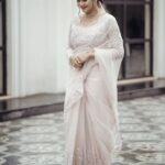 Aditi Ravi Instagram - 🤍🤍🤍 Photography - @nostalgiaevents.in Costume - @kahani_stories_in_thread MUAH - @merins_remyamerin Jewellery- @meralda.jewels Location - @portmuziriskochi #instagram #white #smile