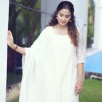 Aditi Ravi Instagram - White has it all. 📸 : @arif_ak_photography hair: @sreegeshvasan_makeupartist