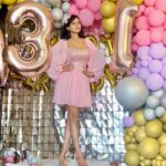 Akansha Chamola Instagram - People always complain that i dnt know how to act my age ……… Well in my defence : I have never been this age before !!!😛🥳 some more birthday pics nxt few days coz i cnt get over my outfit ☺️☺️☺️☺️☺️ . . . . . . . . . . . . . . . . . . . . . . . #january #capricorn #birthdaygirl #birthdayoutfit #outfitideas #pretty #pinkdress #sequindress #instalook #instamood #fashiongram #outfitinspo #lookbook #instahair #instamakeup #birthdaypost #balloondecoration #balloondecor #birthdaymonth #happy #prettygirls #trending #fashiongram