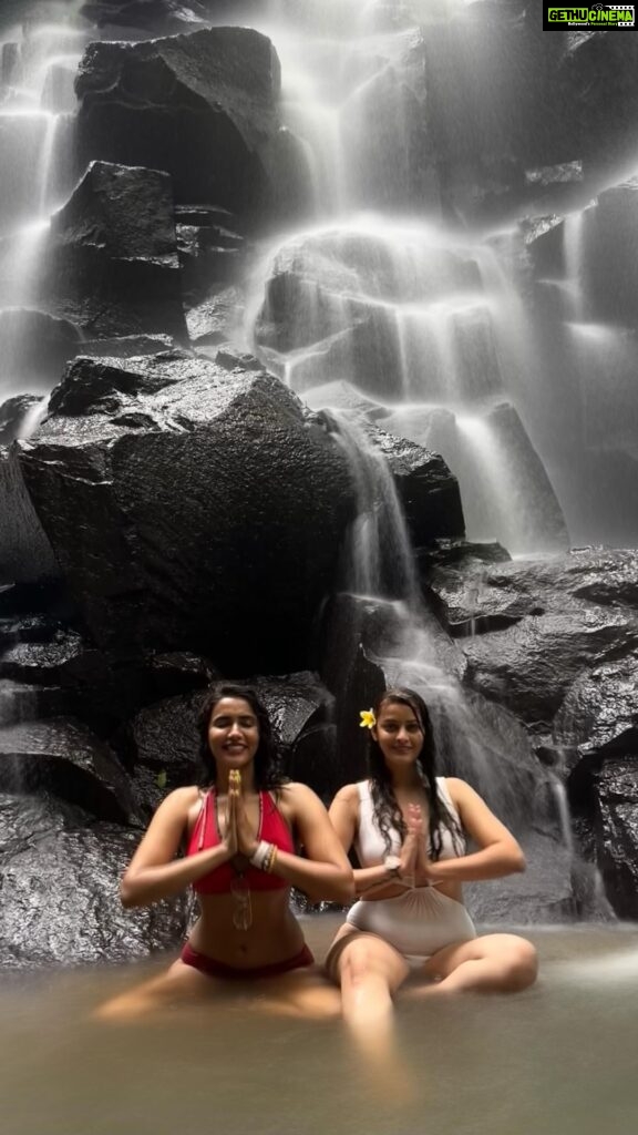 Akshara Gowda Instagram - In the wild, chasing waterfalls with your bestie hits different! This one was at Kanto Lampo waterfall in Bali and unlike other waterfalls this one was safe to stand or sit under. This waterfall is also very easy to get to and you don’t have to go through miles and miles of hiking and trekking to reach here. If you are a photography enthusiast, you can climb up the rocks on the top of the waterfall and get some nice, instagram worthy pictures. . . #bali #wonderfulindonesia #baliwaterfalls #chasingwaterfalls #waterfall #girlstrip #travelwithbestie #travelgram #luxurytraveller #zenmode