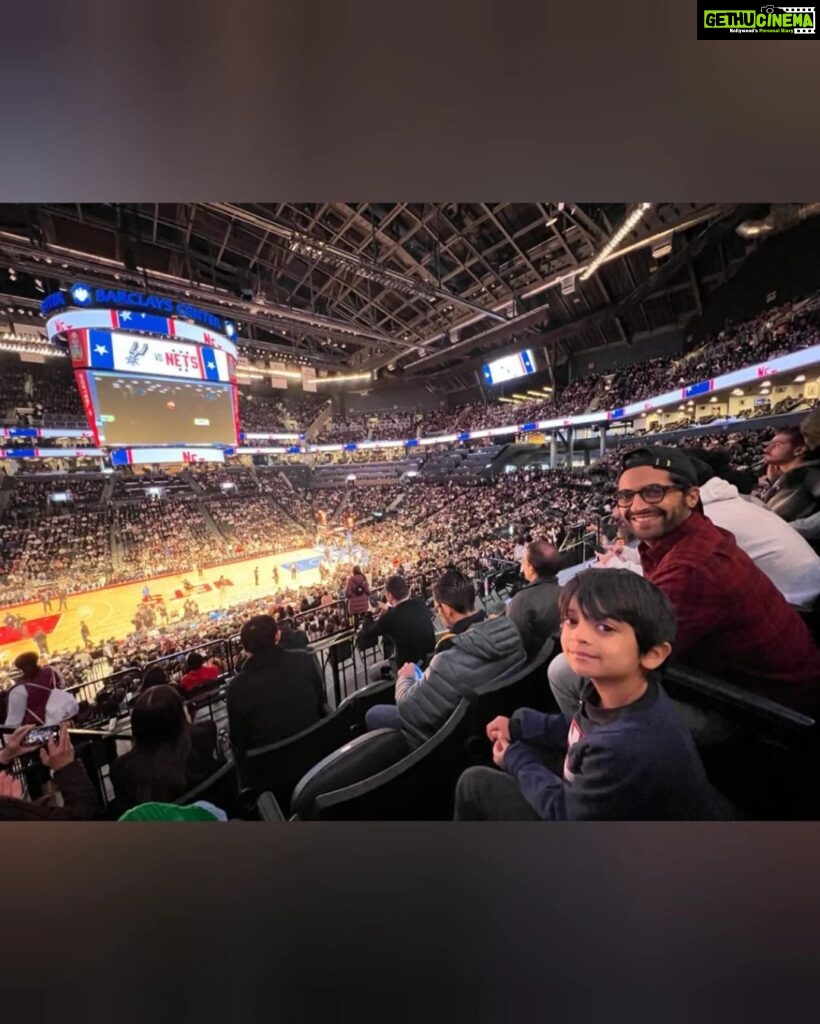 Akshay Oberoi Instagram - Witnessed my childhood favs (& now my child's favs too) @brooklynnets win the game 🏀 Perfect end to a perfect holiday :) P.S. Swipe left to see two fans giving their undivided attention 😬 @nba @nbaindia #NBA #NBAFans #Basketball #LikeFatherLikeSon Barclay's Center, Brooklyn