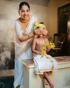Amrutha Nair Instagram - കണികാണും നേരം കമലനേത്രന്റെ നിറമേഴും മഞ്ഞ തുകിൽ ചാർത്തി കനക കിങ്ങിണി വളകൾ മോതിരം അണിഞ്ഞുകാണണം ഭഗവാനെ ♥️ @avni.vineeth 😘 Pic @colorpadam_photography @vipinjkumar MUA @blushingtone_by_veenavineeth Attire @tanirika_collectio Ornaments @gem.forher Blouse design @vybhadesignerstudio Trivandrum, India