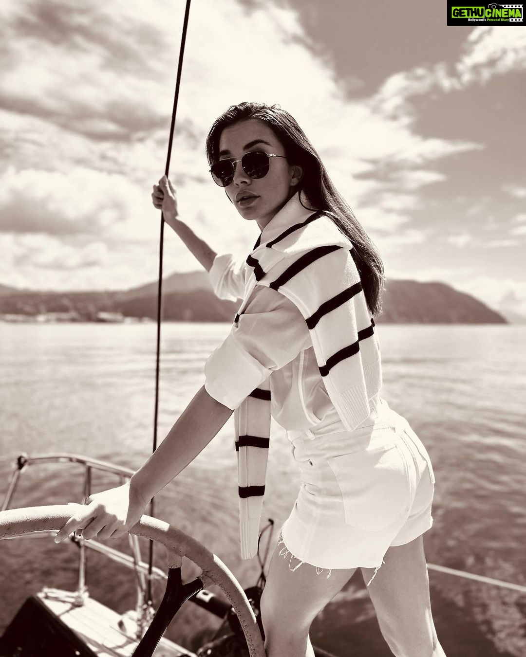 Amy Jackson Instagram - Yesterday we celebrated #WorldOceanDay out at sea with @paulandshark . We were able to reconnect with nature, snorkel with marine life and actually take a moment to breathe in fresh air. It made us remember why it’s so important to love and respect our oceans. As human beings we’re all water babies. Whether we go as far back to our evolution or to the nine months before we’re born; swimming around in our Mum’s tummy’s. On top of that we are 60% water and it’s scientifically proven that being close to a water source whether it be natural, manmade or digital instantly has the ability to calm our nervous system - the concept being called ‘Blue Mind.’ So my wish for everyone this #WorldOceanDay is to fall back in love with our waters. When we enjoy and appreciate them, I know we will do a better job at protecting them as well as reaping the health benefits ourselves ________________________ Whilst we were World Ocean Day, I received devastating news about a @seashepherduk mission close to my heart. They reported on another whale slaughter in the Faroe Islands this week. 63 whales, including pregnant females and their foetuses, 6 juveniles and 2 very young calves had their lives taken from them in a cruel and indefensible way. Not only are these barbaric hunts cruel and unnecessary but they also have an extreme knock on effect to our ocean’s biodiversity which then affects us. Please stand with us to persistently put pressure on politicians and decision makers who have the power to end these slaughters. There’s not one article in the press about this since last year. We need to share and repost across our channels to ensure this comes to an end. Find more information on @seashepherduk Again, thankyou @paulandshark and @tigubeach for all of your conservation work and having us be apart of your #FollowTheShark sail. Amy 💙 Portofino Coast, Italy
