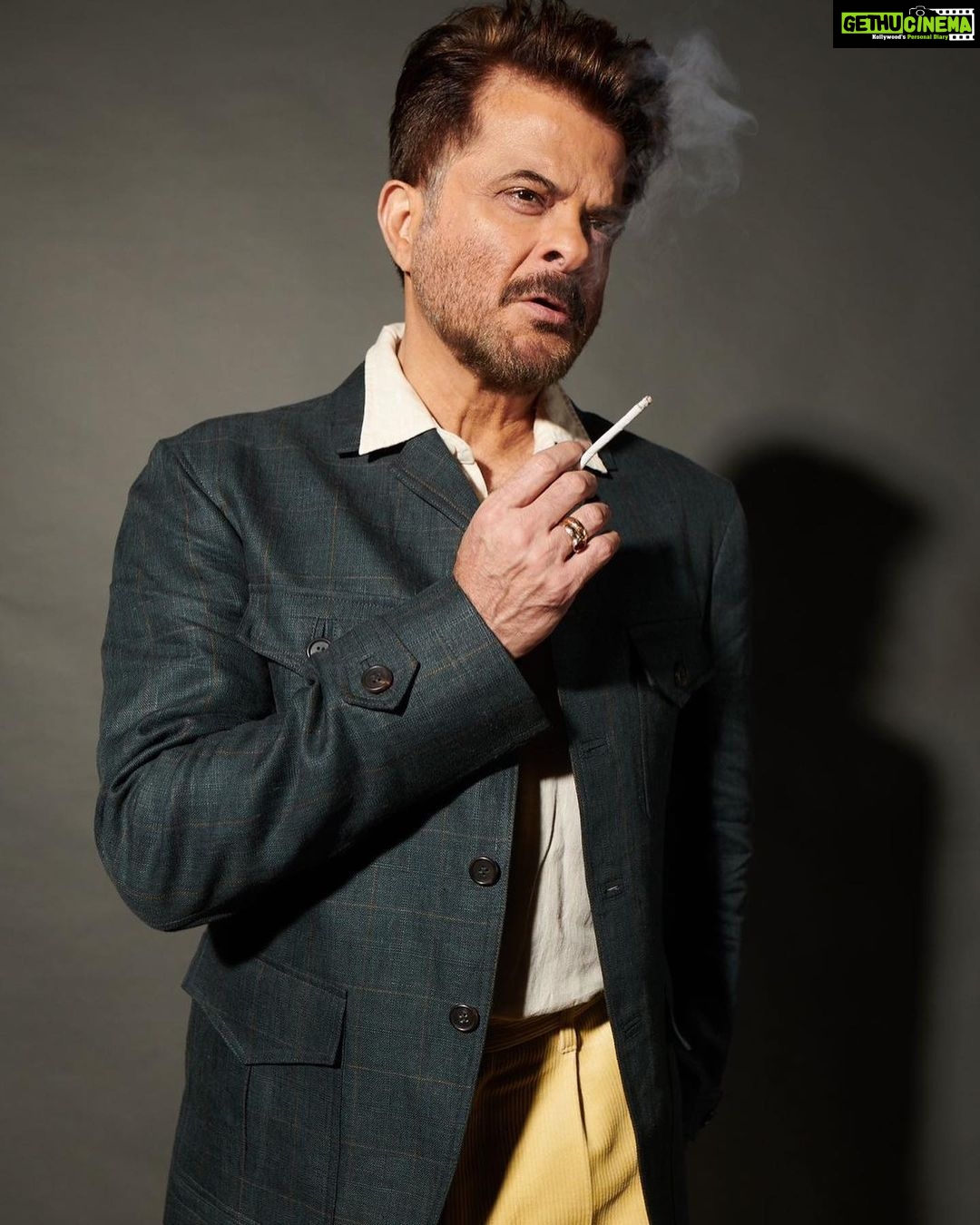 Anil Kapoor Instagram - Coming for you, Bigg Boss for #TheNightManager @disneyplushotstar Photographer:@vaishnavpraveen @thehouseofpixels Stylist: @kshitijkankaria And @saloniparekh__ Hairstylist: @raskarjaipal @whynot_byzeeba Makeup Artist: @deepakchauhanartist Disclaimer : Smoking is injurious to health.