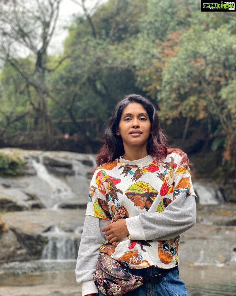 Anjali Patil Instagram - Waterfalls are God in speed! And Meghalaya was all about seeing them in different styles. I clocked almost 10-12 different types of waterfalls in a single day. The joy of witnessing the shear power of flowing water, through roots, through stones, through jungles is almost like being in the presence of godlike entity. No wonder this visit filled me with pure joy and stillness. The mystical Meghalaya is truly once in a life time experience. @meghiff @meghtourism #traveldiary #meghalaya #waterfalls #meghalyatourism