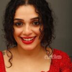 Ann Augustine Instagram - ❤️ @vanithamagazine 📸 @sreekanth_kalarickal Stylist. @pushpamathew28 Makeup. @_femy_antony_ Costume. @kahani_storiesinthread #vanitha#covershoot#backhome#backtotheroots#funshoot#allred#curls#curlyhair#jewelleryaddict#coffeelover#bestteam#artlover