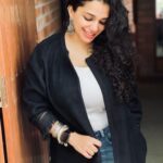 Ann Augustine Instagram - white top, a warm jacket, silver & loads of Kajal! #jackets#black#silver#statementearrings#pridemonth#stackedbangles#silverlove#staysafe#curls#curlyhair#jewelleryaddict#zarawoman#coffeelover#miramarfilms#artlover