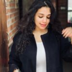 Ann Augustine Instagram - white top, a warm jacket, silver & loads of Kajal! #jackets#black#silver#statementearrings#pridemonth#stackedbangles#silverlove#staysafe#curls#curlyhair#jewelleryaddict#zarawoman#coffeelover#miramarfilms#artlover