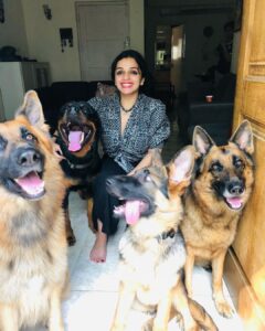 Ann Augustine Instagram - Me.
Me & the pack.🧡 

#black#me#shepherds#rottweiler#favourites#besties#chokers#silver#silverlove#jewelleryaddict#allblackeverything#ootd#curls#curlyhair#mysquad#coffeelover#artlover