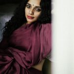 Ann Augustine Instagram - This is a season for Red, May this be a time to reflect on small joys and tiny moments of happiness that showed us who we truly are, and gave us strength and hope to keep going no matter what. Merry Christmas to all of you!❤️ 📸 @clintsoman #red#christmasfeels#christmasvibes#saree#sareelove#life#art#jewelleryaddict#curls#curlyhair#coffeelover#magichour#tattooart#silver#silverlove#soulful