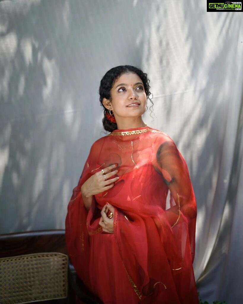 Anna Ben Instagram - Red Dahlia ✨ Wearing : @picchika * * * #portraits #annaben #red #light #sony #35mmfilm #fashion #artist #film #portraitphotography #portraitphotography #sonyalpha #kochi Kochi Kerela, India