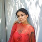 Anna Ben Instagram - Red Dahlia ✨ Wearing : @picchika * * * #portraits #annaben #red #light #sony #35mmfilm #fashion #artist #film #portraitphotography #portraitphotography #sonyalpha #kochi Kochi Kerela, India
