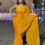 Antara Biswas Instagram – So Many Songs In Mind On This Yellow Saree… You Suggest Me For My next #reel 🤷‍♀️

#beqaboo #tonight at 9pm 

Mua : @makeupbyshahrooq 
📸: @deepakpathak663 Film City