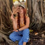 Ashnoor Kaur Instagram - Banyan tress, ocean breeze… Curious mind, a little at ease… Endless summer, take me there… Wanderlust spirit, with forest wood in air🪵 . #ashnoorwrites #maldives #forest #islandlife (Swipe till the end to see me as Tarzan🤣) . . . Wearing @howwhenwearclothing Jewellery @designsbyjewelsgalaxy @designsandyoustudio Hat @merakilifestudio @planmyleisure @sunsiyamresorts @sunsiyamiruveli #planmyleisure #sunsiyam #iruveli Maldives