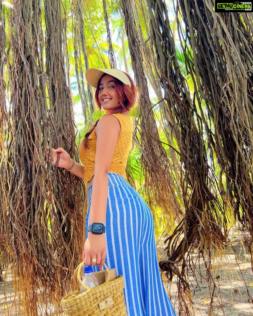 Ashnoor Kaur Instagram - Banyan tress, ocean breeze… Curious mind, a little at ease… Endless summer, take me there… Wanderlust spirit, with forest wood in air🪵 . #ashnoorwrites #maldives #forest #islandlife (Swipe till the end to see me as Tarzan🤣) . . . Wearing @howwhenwearclothing Jewellery @designsbyjewelsgalaxy @designsandyoustudio Hat @merakilifestudio @planmyleisure @sunsiyamresorts @sunsiyamiruveli #planmyleisure #sunsiyam #iruveli Maldives