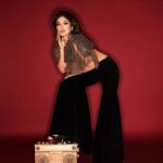 Bhumi Pednekar Instagram - Mood: Yaad aa raha hai tera pyaar 🎶✨ Editor: Nandini Bhalla (@nandinibhalla) Photographs: Vaishnav Praveen (@vaishnavpraveen) Styling: Mohit Rai (@mohitrai) & Sohiny Das (@sohinydas) Make-Up: Sonic Sarwate (@sonicsmakeup) Hair: Marcelo Pedrozo (@marcepedrozo) Production: April Studios (@april.studios) Wearing a gold crystal top with mesh detailing and black velvet bell bottoms, both Siddartha Tytler (@siddartha_tytler); Papa Drip: Danglers and Honey Pop: Ring, both Papa Don’t Preach by Shubhika (@papadontpreachbyshubhika); and Dasia 125 Sandals, Jimmy Choo (@jimmychoo)