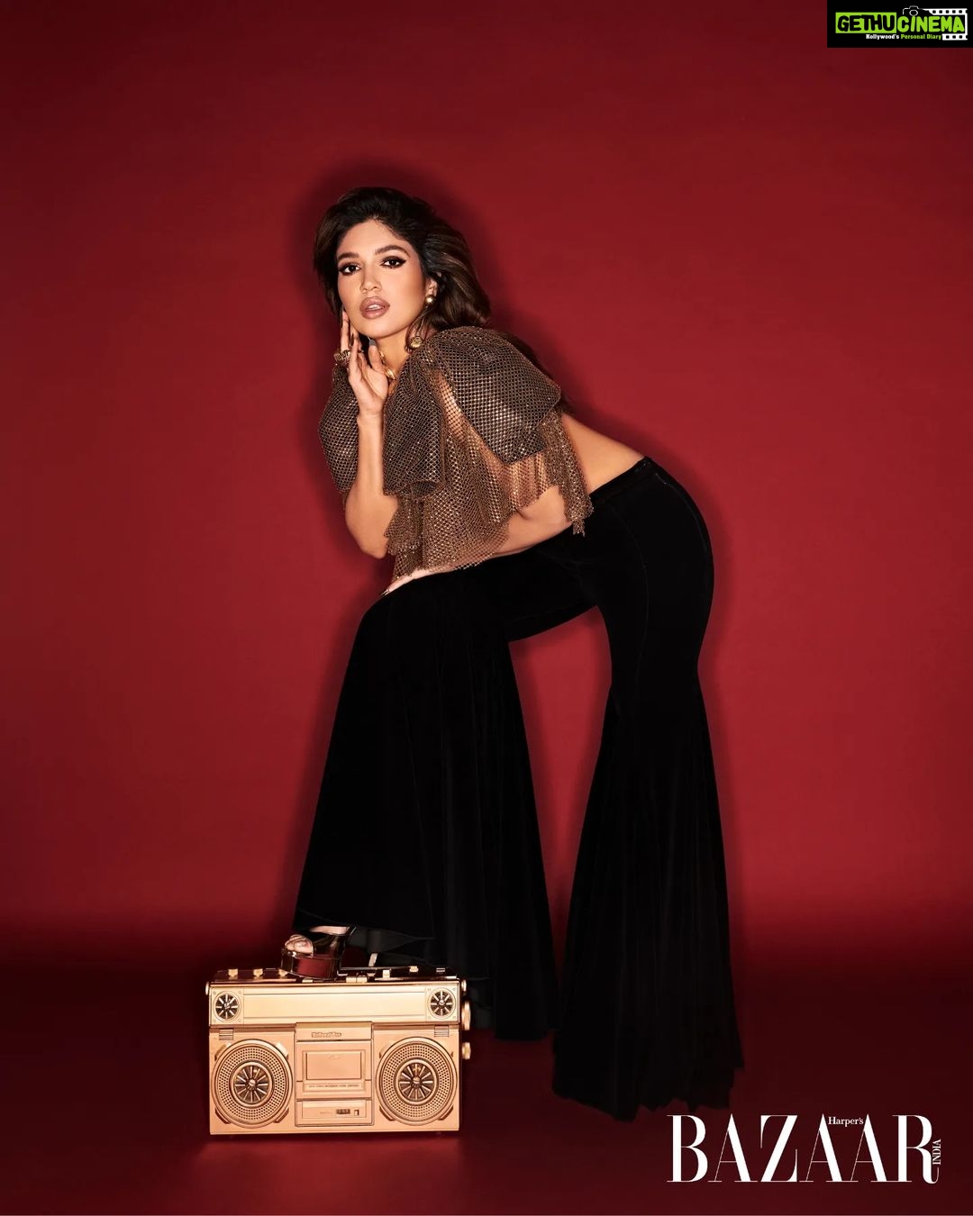 Bhumi Pednekar Instagram - Mood: Yaad aa raha hai tera pyaar 🎶✨ Editor: Nandini Bhalla (@nandinibhalla) Photographs: Vaishnav Praveen (@vaishnavpraveen) Styling: Mohit Rai (@mohitrai) & Sohiny Das (@sohinydas) Make-Up: Sonic Sarwate (@sonicsmakeup) Hair: Marcelo Pedrozo (@marcepedrozo) Production: April Studios (@april.studios) Wearing a gold crystal top with mesh detailing and black velvet bell bottoms, both Siddartha Tytler (@siddartha_tytler); Papa Drip: Danglers and Honey Pop: Ring, both Papa Don’t Preach by Shubhika (@papadontpreachbyshubhika); and Dasia 125 Sandals, Jimmy Choo (@jimmychoo)