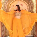 Daisy Shah Instagram - You had me at Yellow. . . . Wearing: @awignaofficial Earrings: @aartie_miranni 💍: @pinklanebyrashi Styled by: @trishadjani 📸: @framefuchsiaphotography . . . #weddingdiaries
